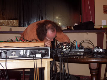 Special guest Giorgio Magnanensi performs circuit-bent toys at Jamming the Dragon in Winnipeg. Photo © 2007 Gordon Fitzell