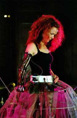 Franziska Baumann performing Electric Renaissance, a live performance and installation for voice, sensorglove, laptop and sound dress. Multisonic Festival, Bukarest, Romania, 2007.